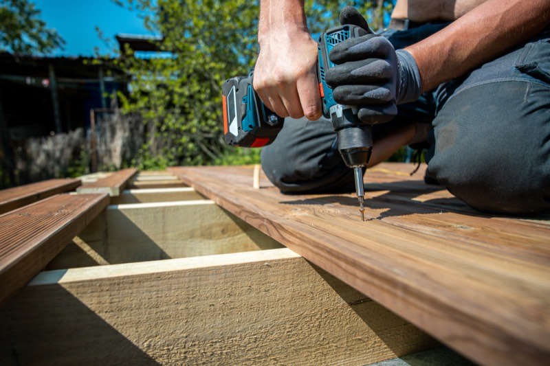 Weathered deck being restored