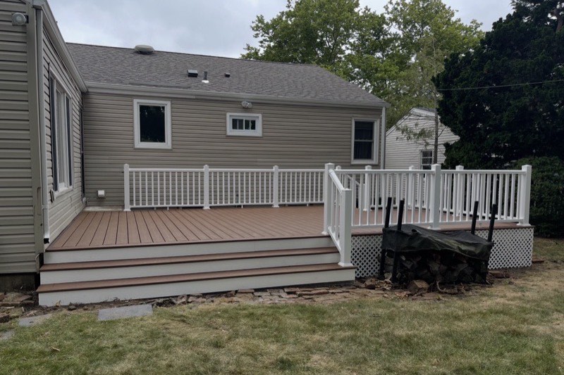 Deck stairs with handrail