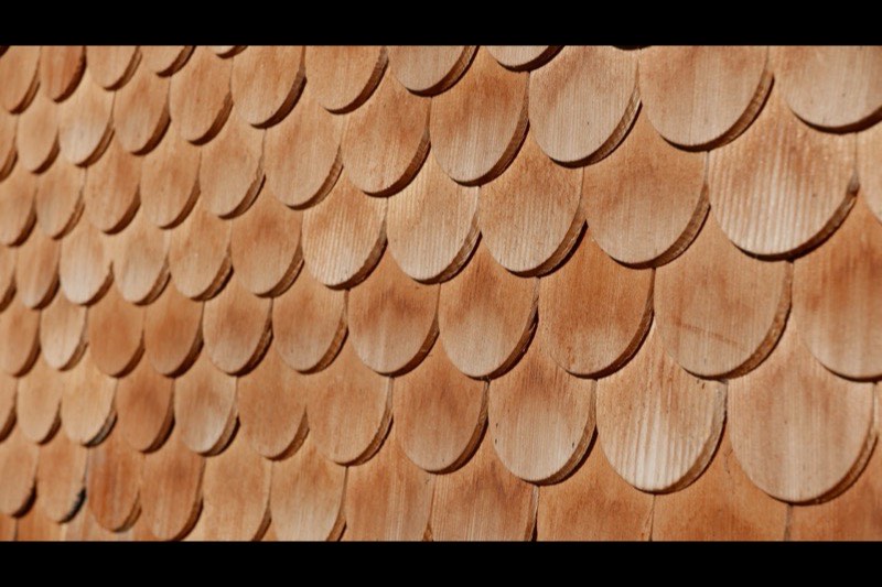 Scalloped fish-scale siding on a gable