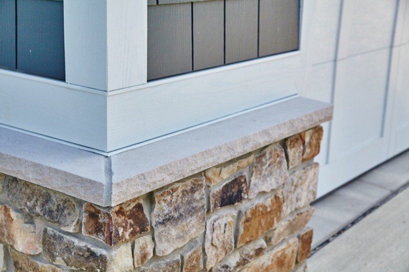 Stone veneer siding on a home exterior